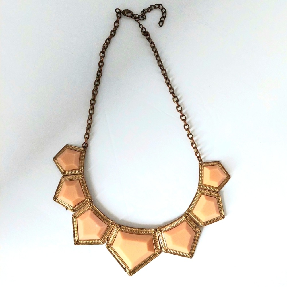 Taupe colored pentagon shaped  beads on goldtone chain and border